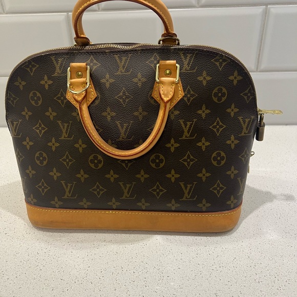 Louis Vuitton Alma Handbag - Picture 1 of 4